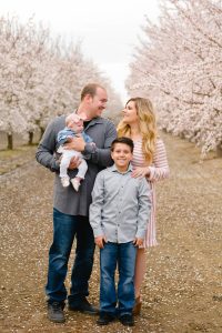 almond blossom spring family photos with grey and blush outfit inspiration