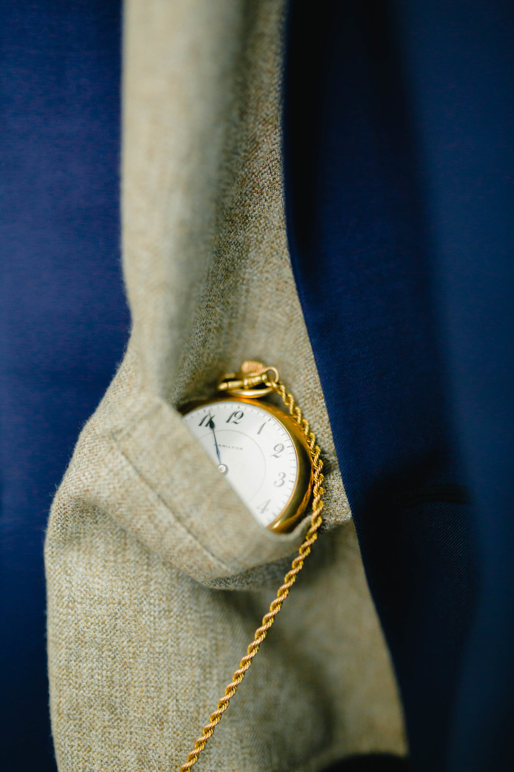 gold pocketwatch heirloom for the groom