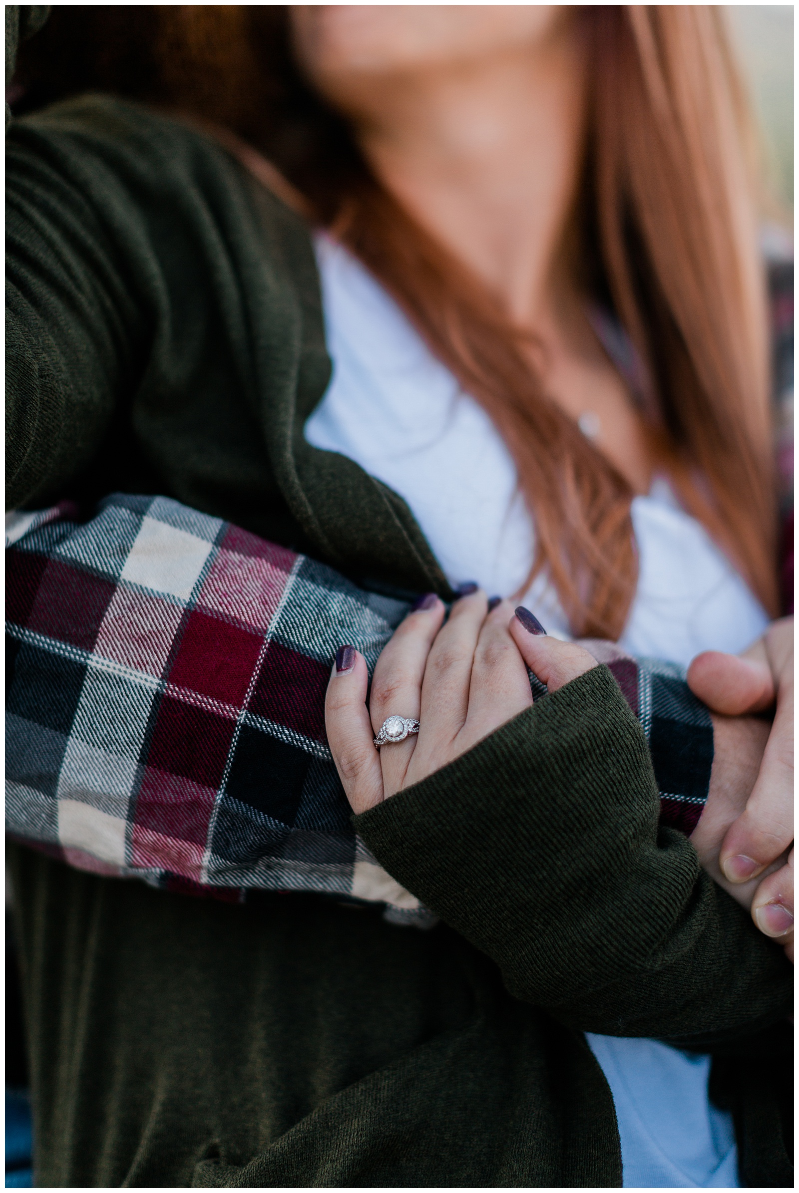 close up photo of an engagement ring during an engagement photo shoot