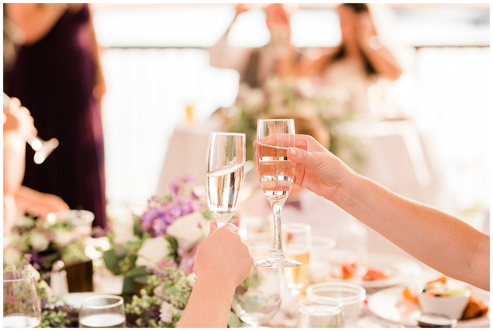 guests toasting during a wedding reception at the pines resort in bass lake