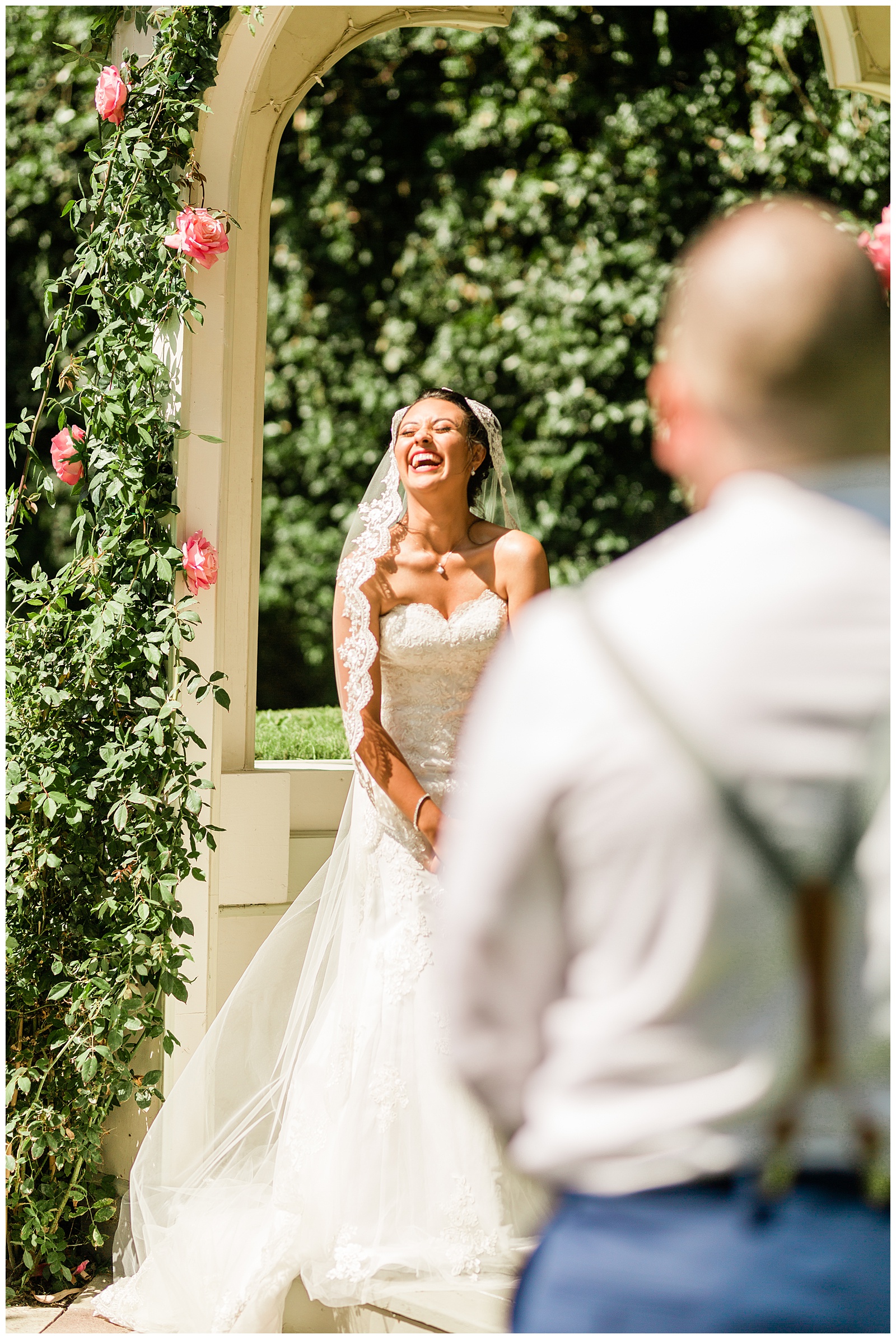 bride smiling and laughing during the wedding ceremony