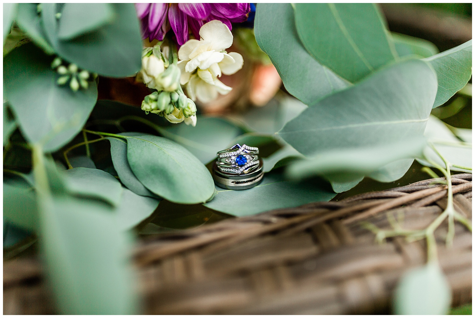 unique sapphire wedding ring with a eucalyptus bouquet