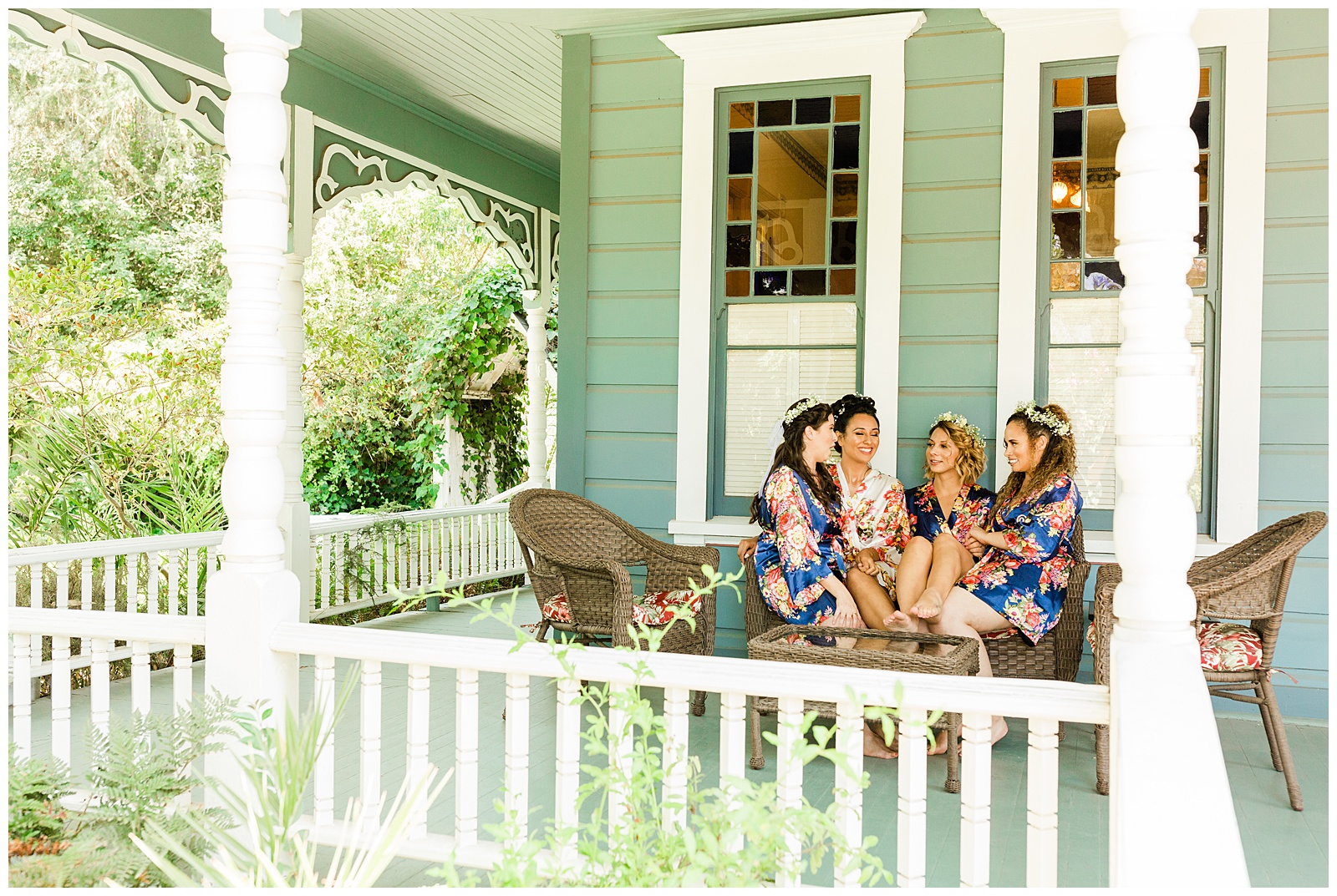 bride and her bridesmaids in floral robes in front of a house in nipomo california