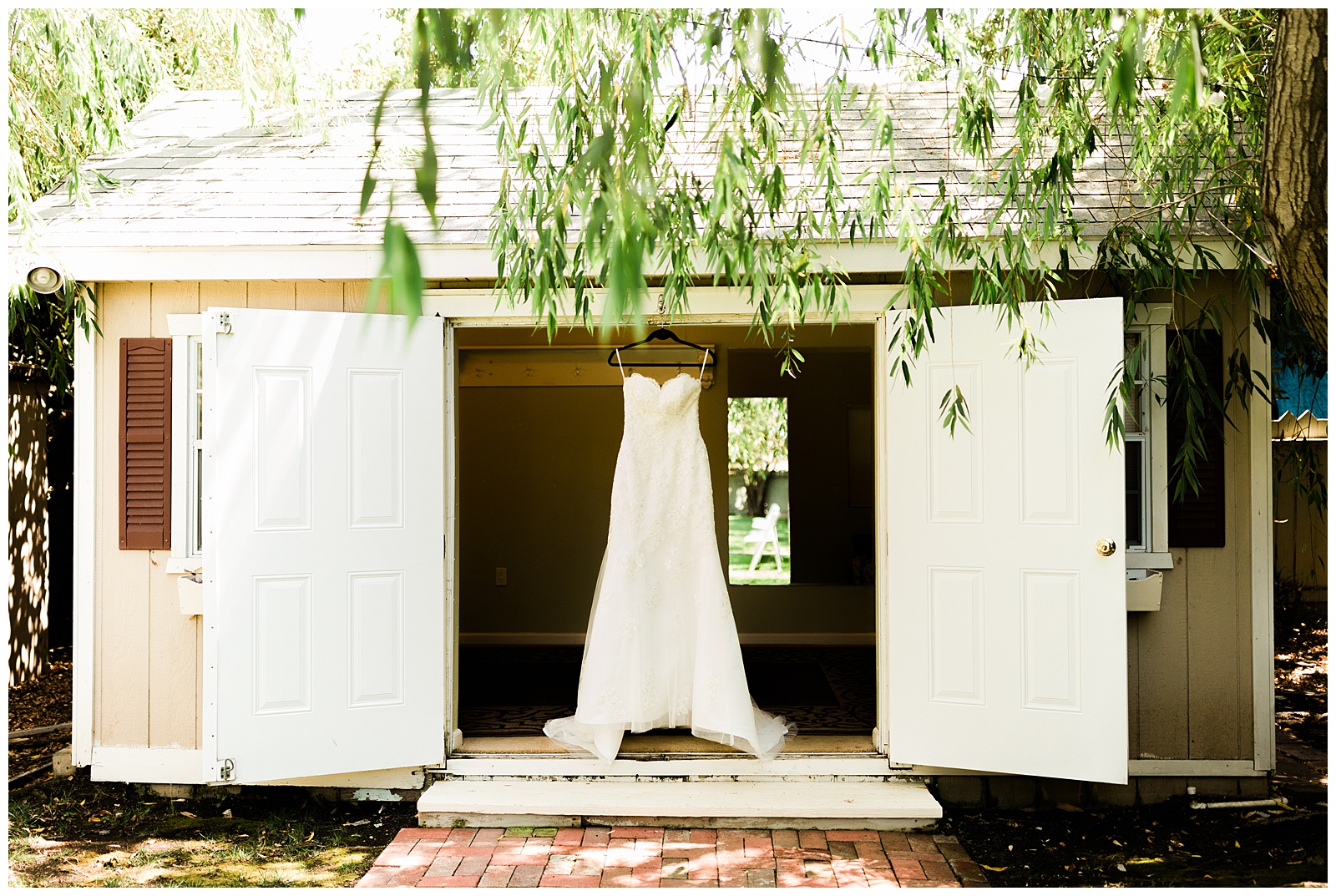 wedding dress hanging in the bridal suite at kaleidoscope inn and gardens in nipomo california