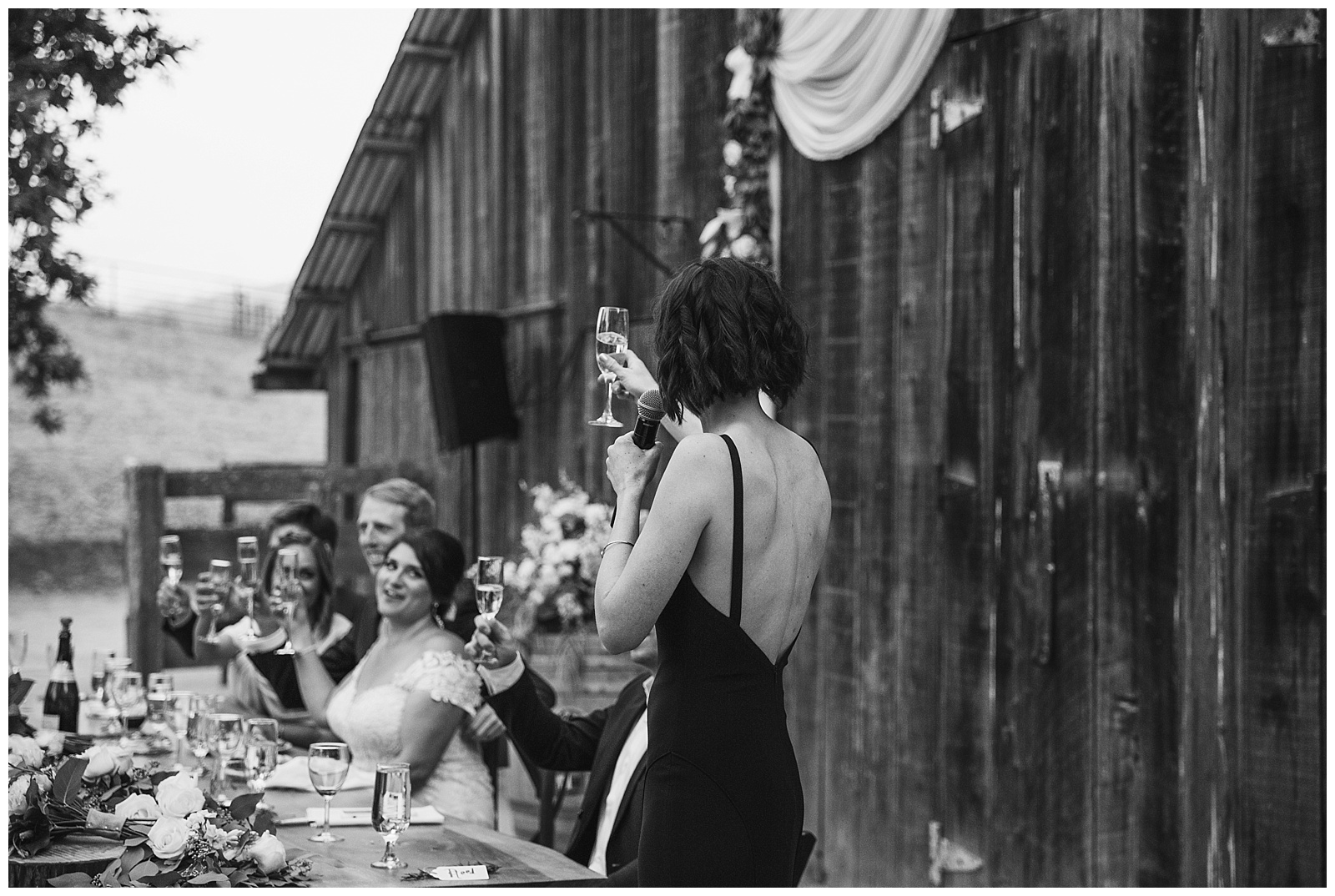 black and white moment during the wedding toasts