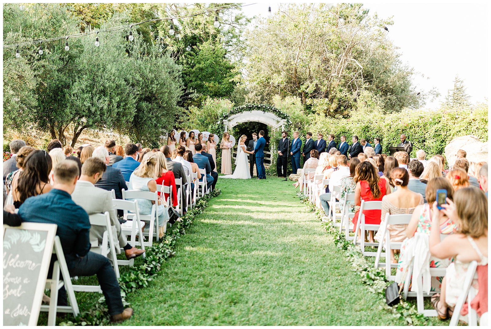 Wide shot of a wedding ceremony at the Madonna Inn
