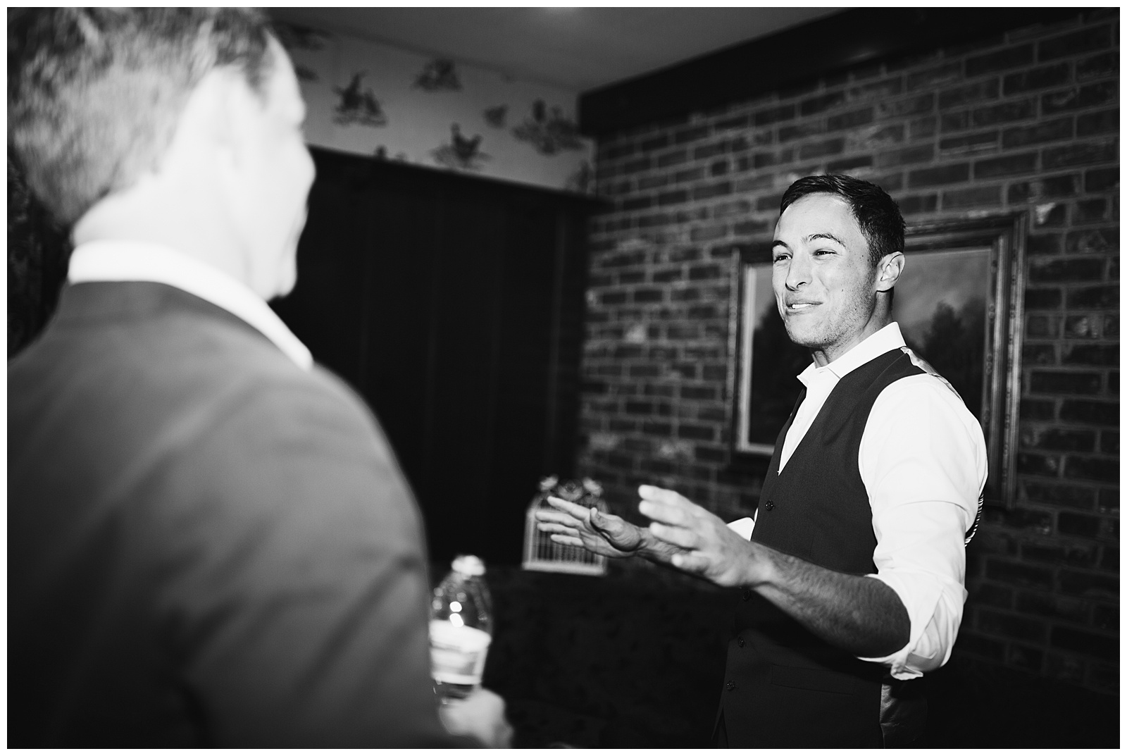 A groom telling jokes with his groomsmen