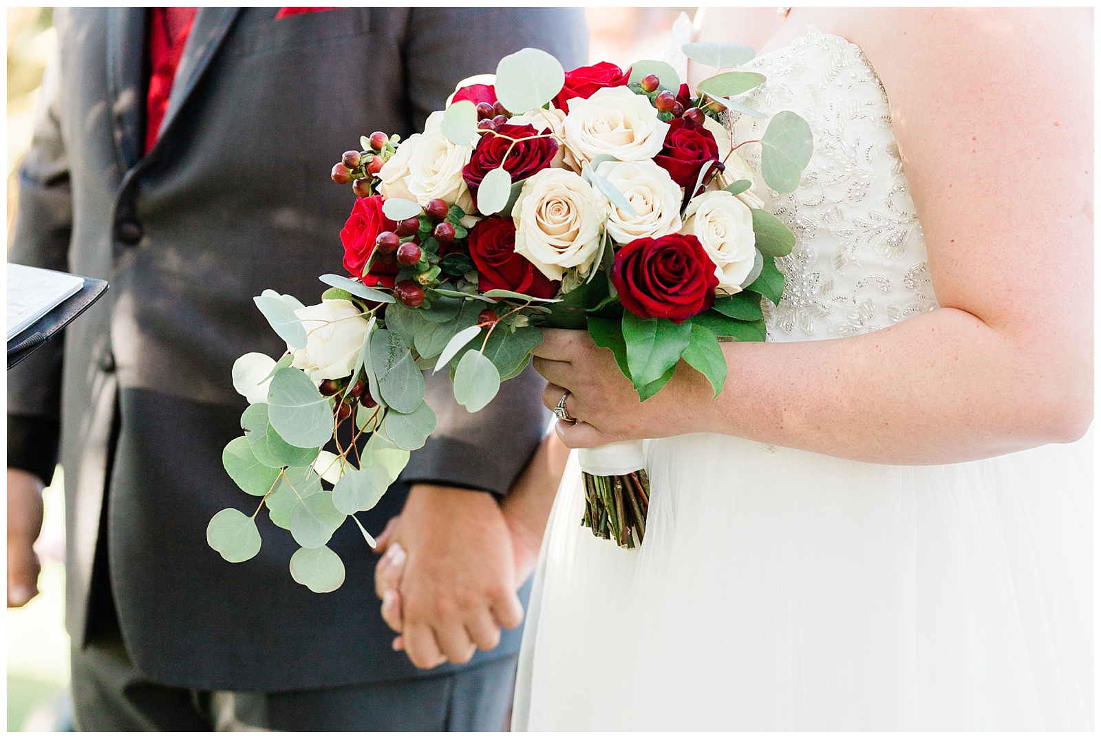 red, white and green wedding bouquet