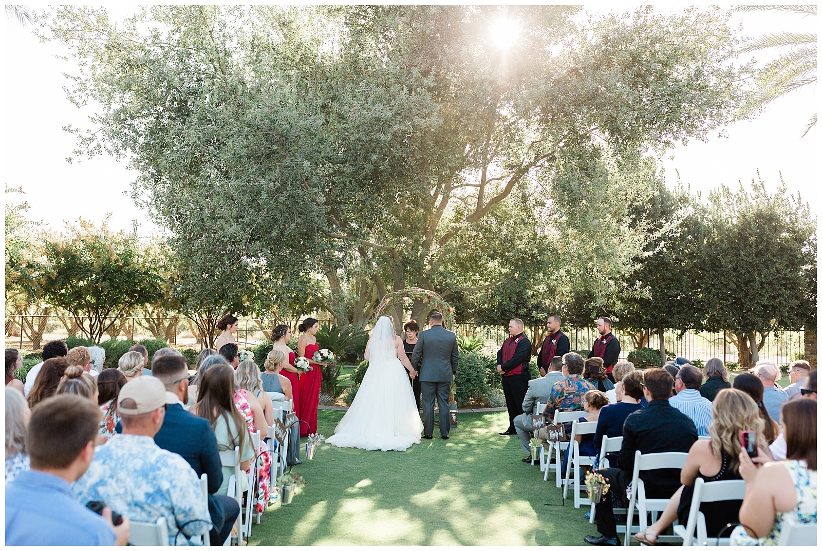 wide angle wedding ceremony photo at Tuscan Gardens Venue in Kingsburg