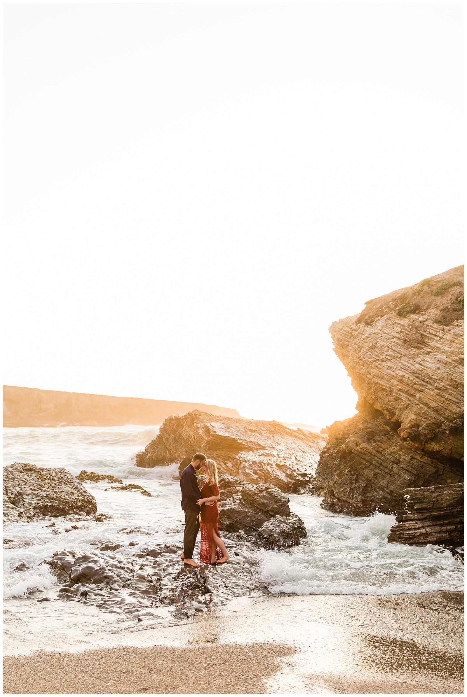 intimate engagement photos on the beach at sunset