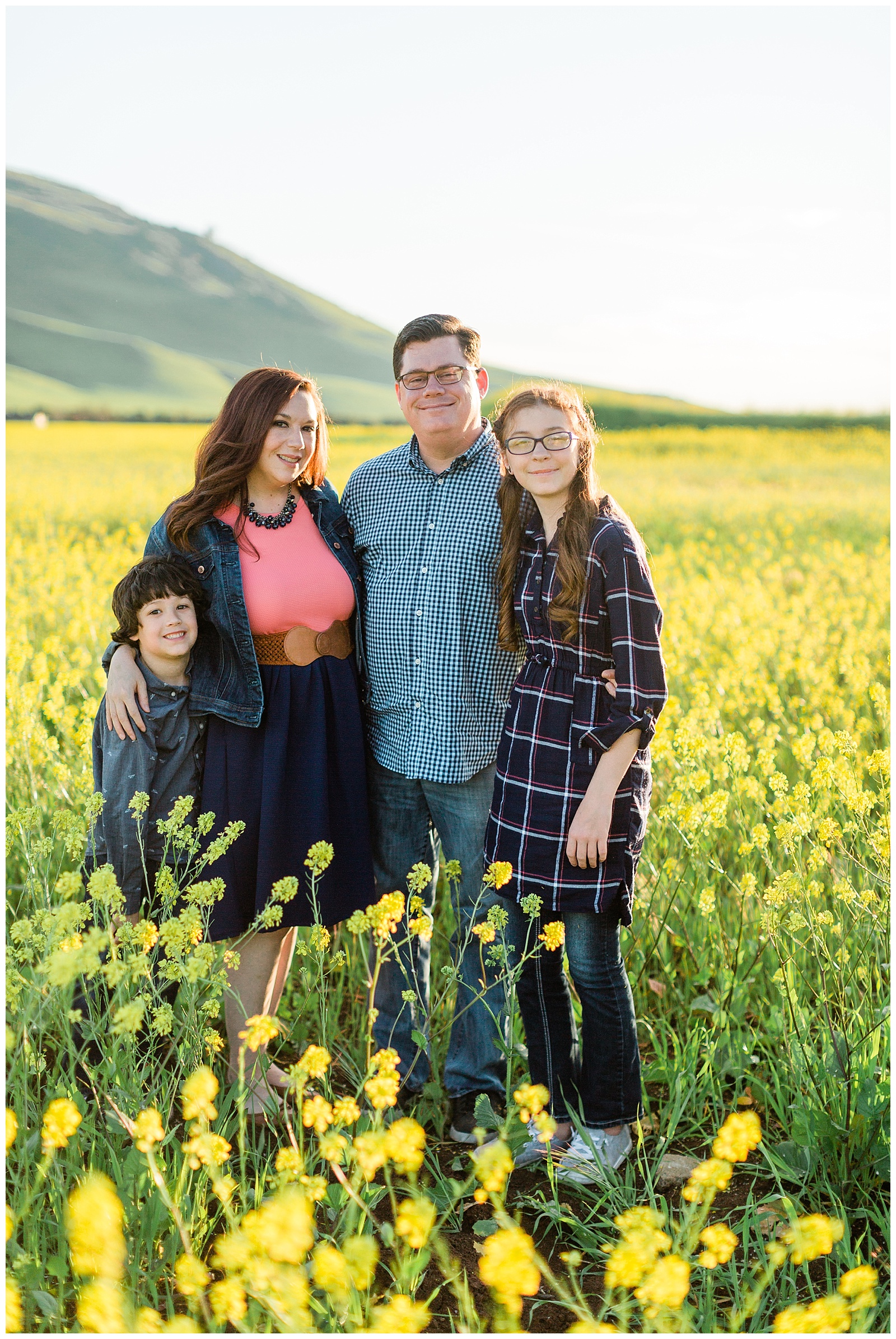 classic family portraits in a wildflower field