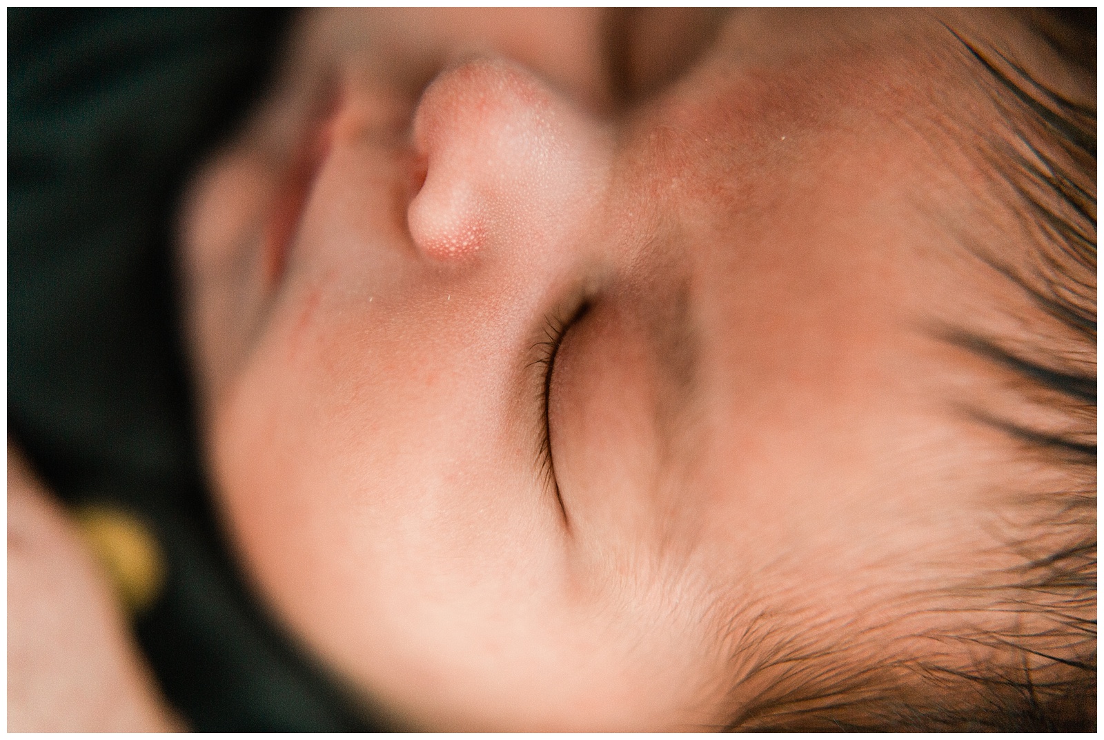close up of newborn baby eyelashes