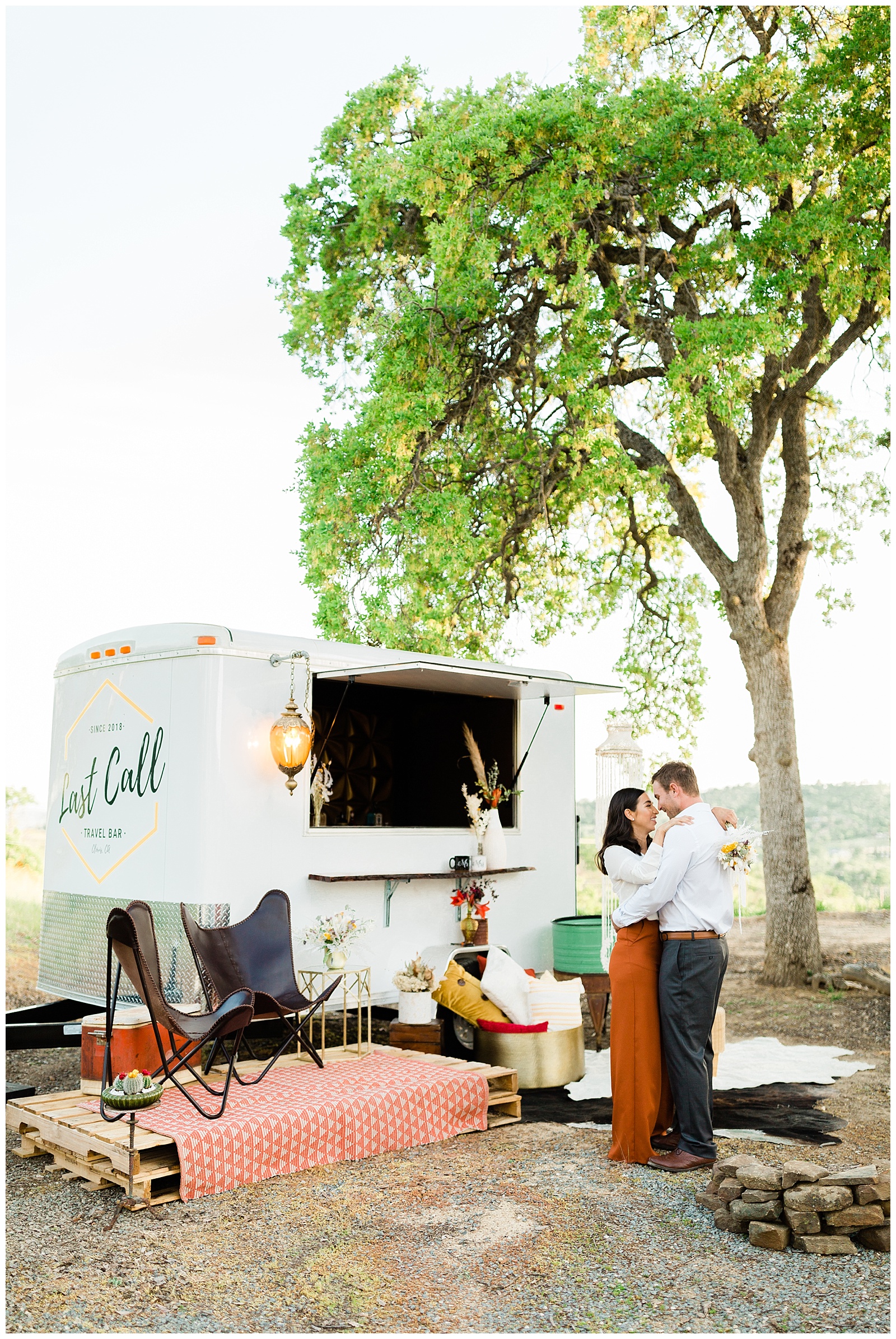 couple dancing in front of Last Call Travel Bar for an elopement styled shoot