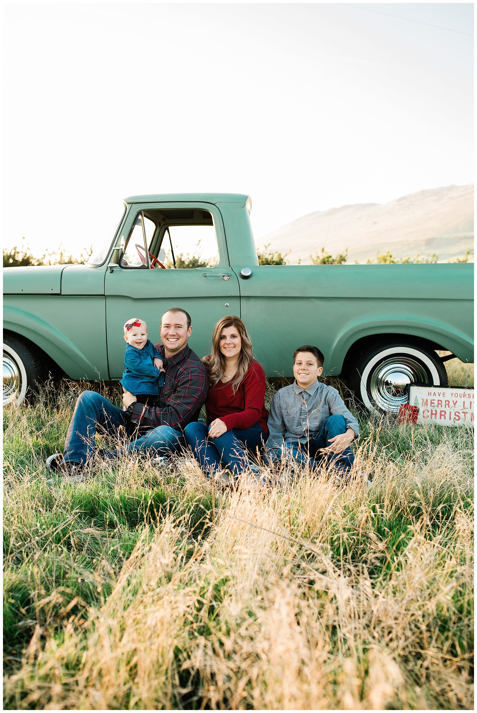 christmas family photos in front of a green old ford truck