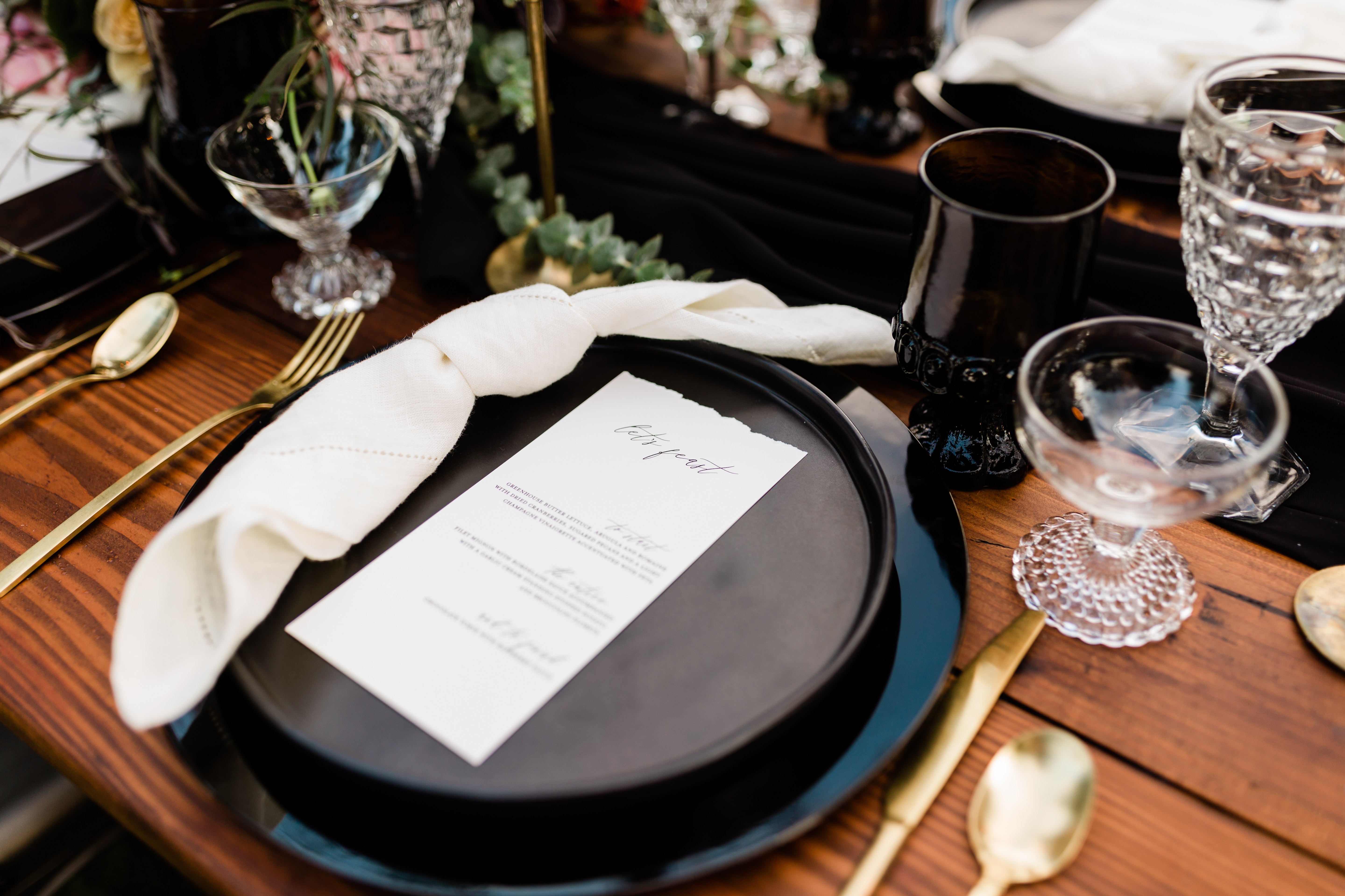 black and gold rustic wedding table setting