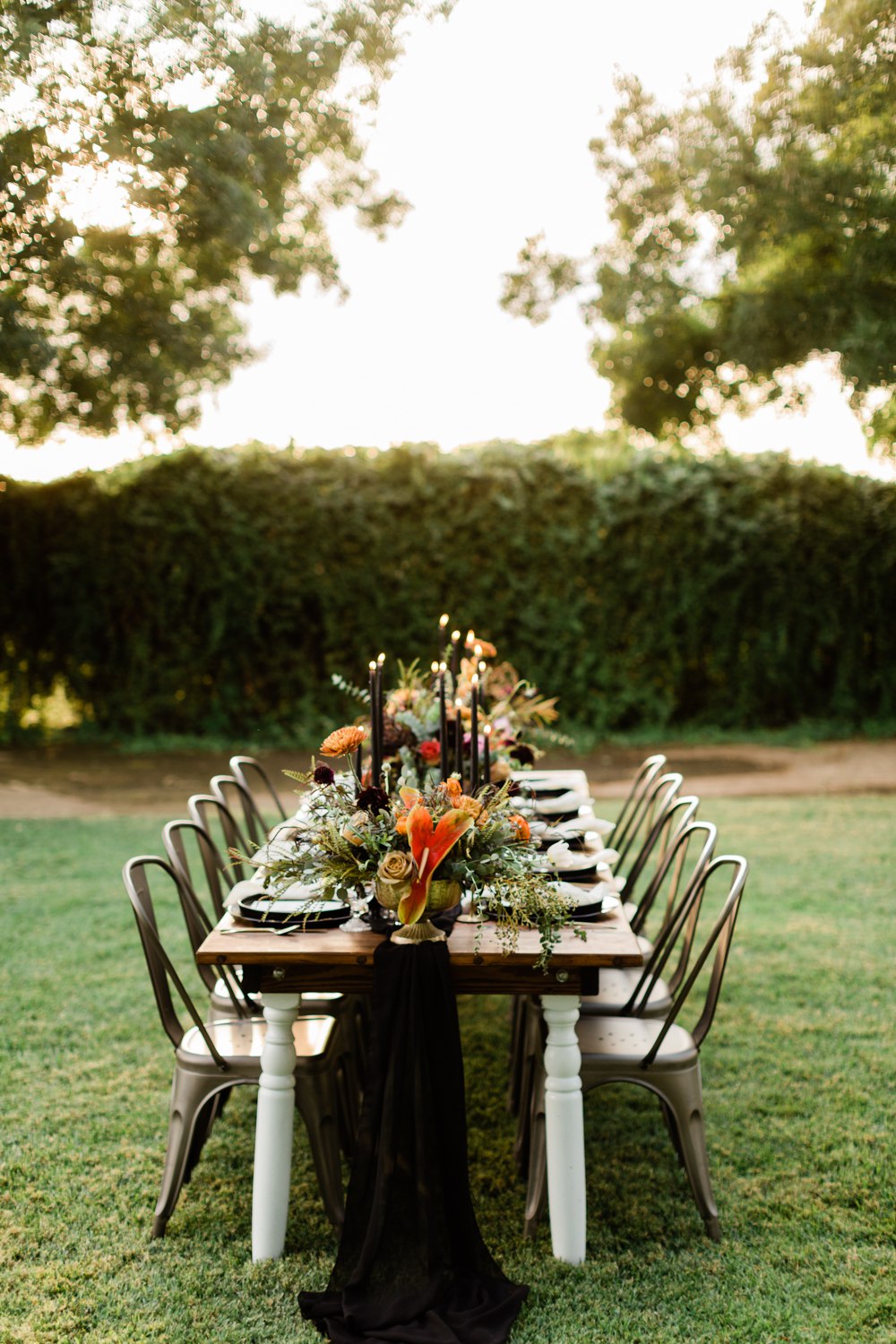 black table runner on a farm style wedding table for a fall fresno wedding