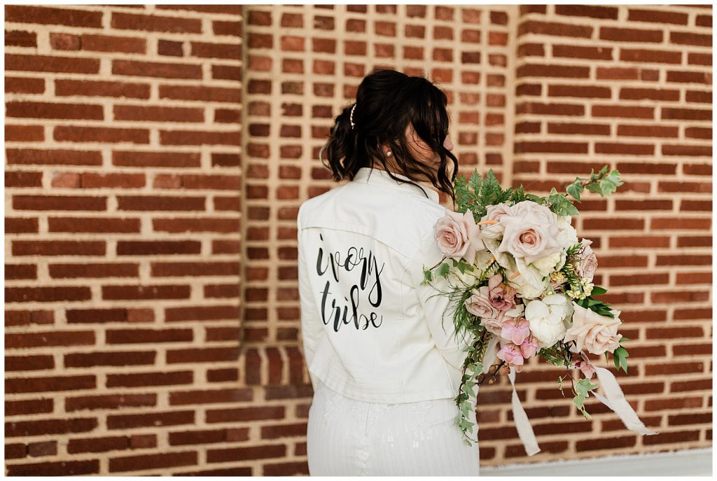 ivory tribe white leather wedding jacket with soft dusty blush florals