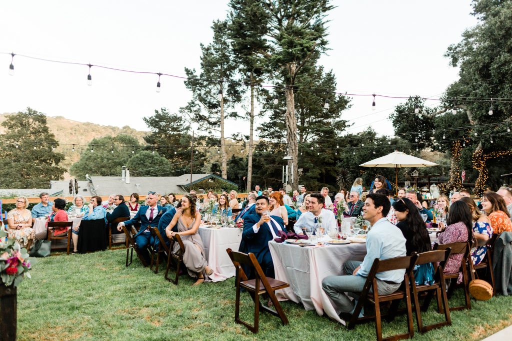 wedding guests at outdoor reception