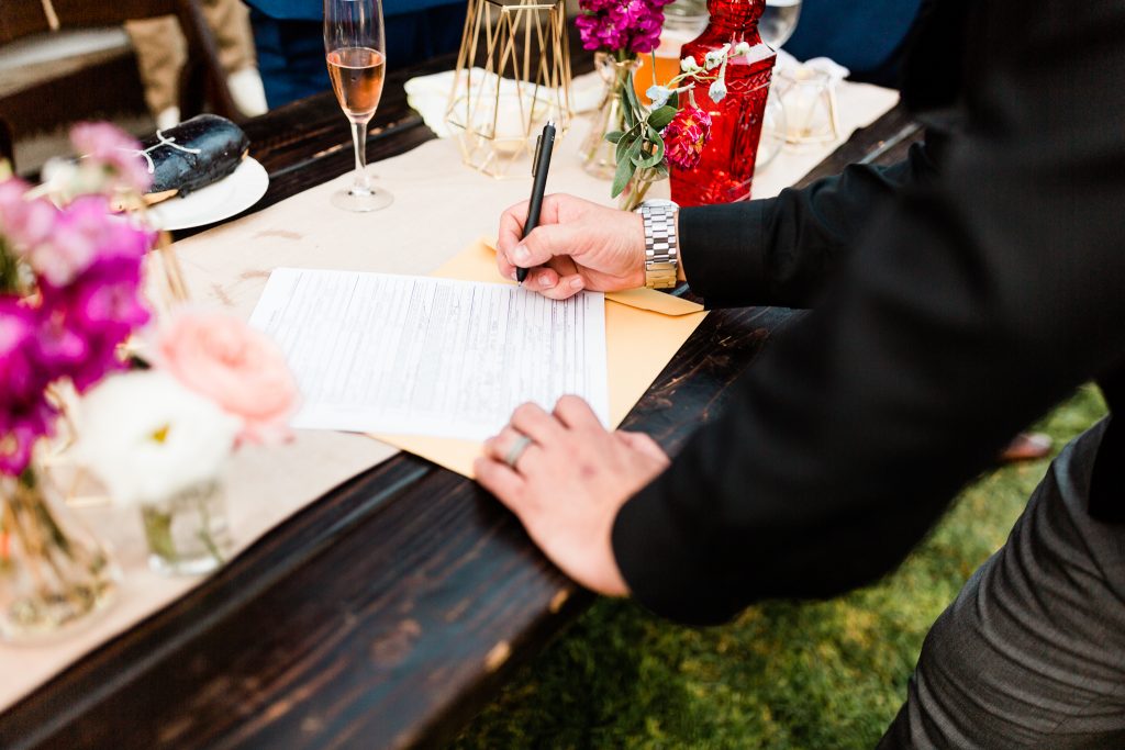 officiant signing marriage license