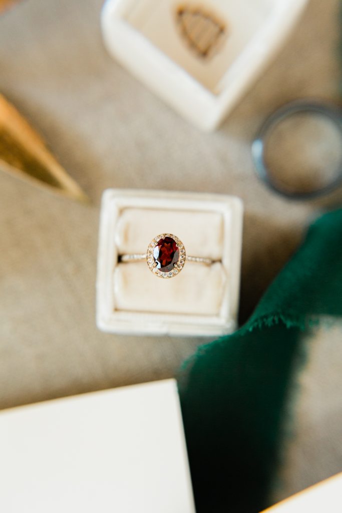 Ruby wedding ring in a velvet ring box for a Christmas wedding
