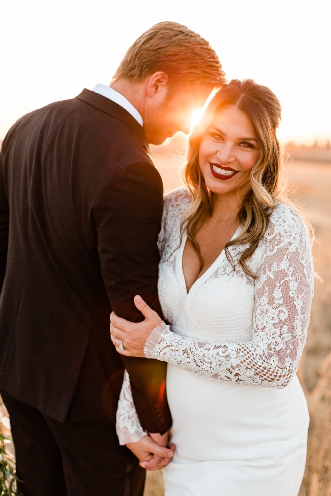 sunset winter wedding portraits at the barn at r and c ranch in clovis california