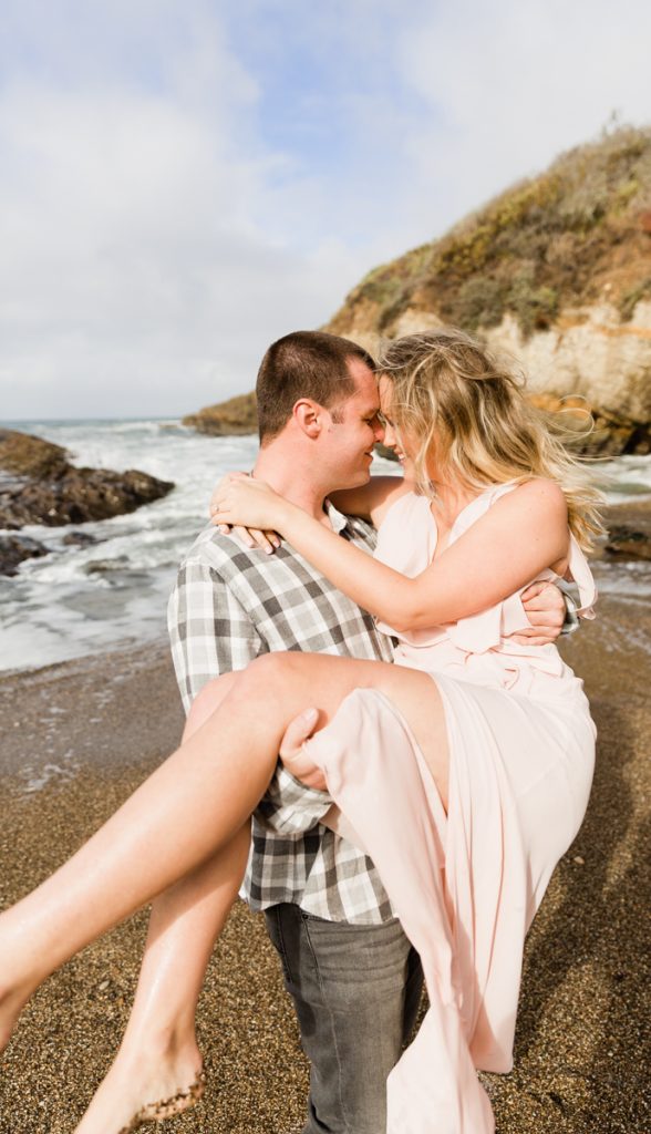 engaged couple on the beaches of montana de oro