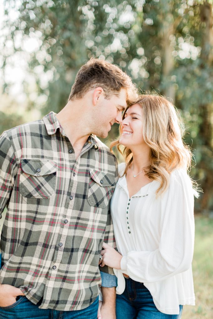 romantic and candid light and airy spring engagement photos