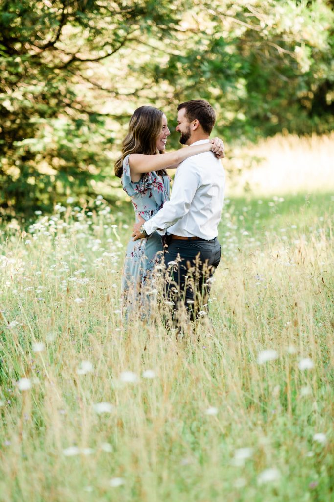 couple slow dancing in a wildflower meadow in shaver