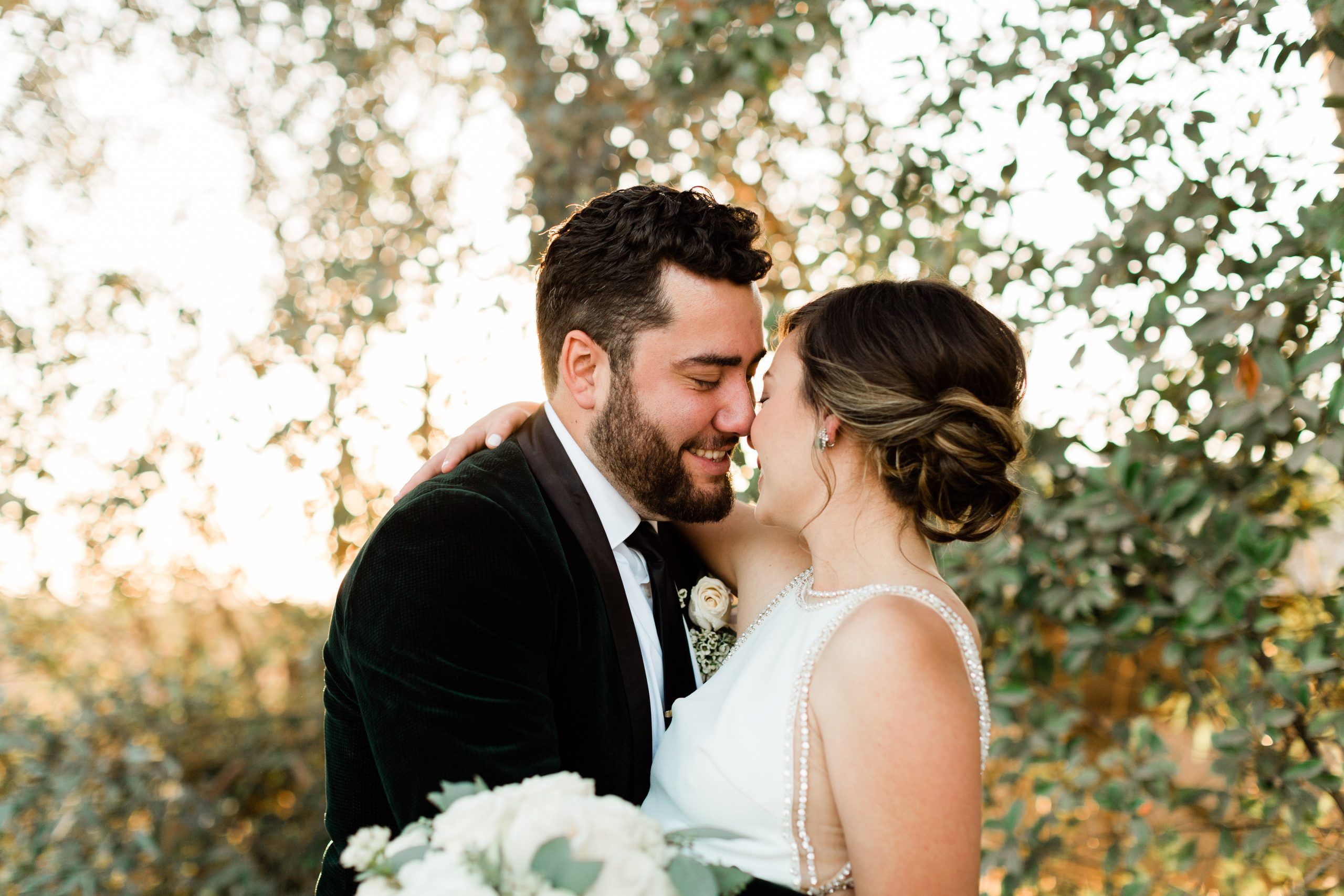 groom and bride almost kissing sunset wedding photos by fresno wedding photographer megan helm