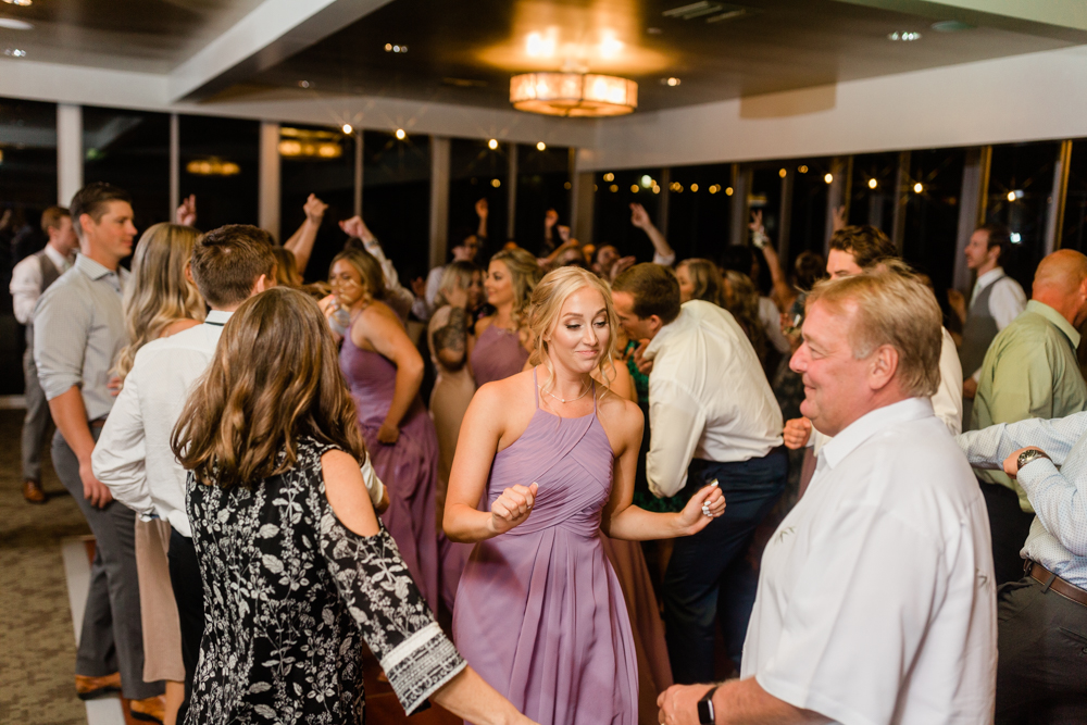 Family dancing together at a country club wedding