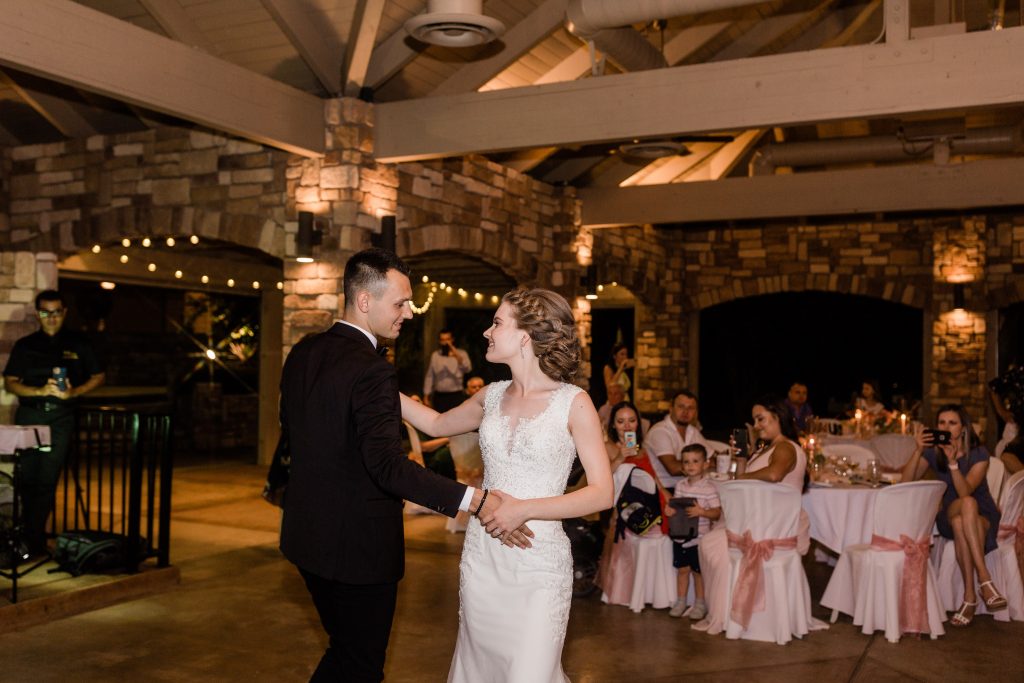 bride and grooms first dance as husband and wife