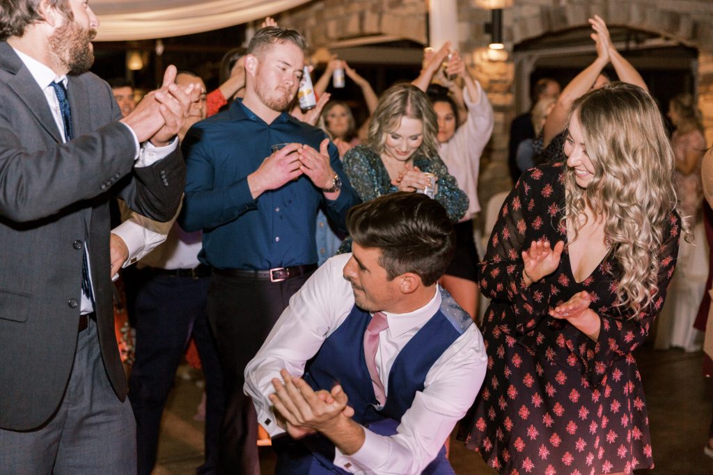 Wedding guests getting down on the dance floor