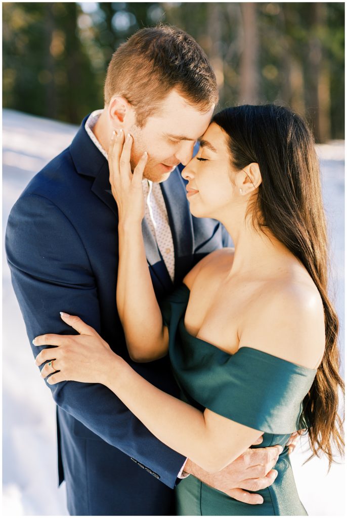 Couple romantically embraced with eyes closed