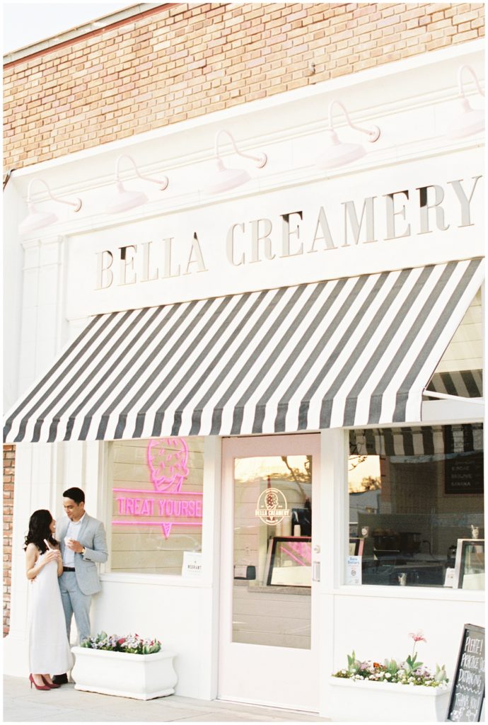 Engaged couple in eating Bella Creamery in downtown Kingsburg