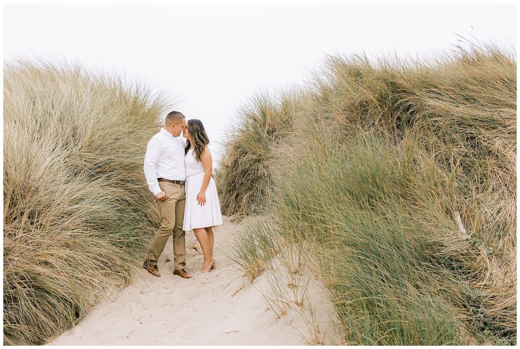 Couple in the pampas grass at PIsmo Beach 