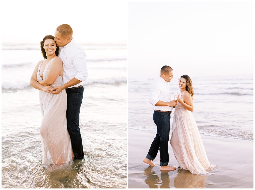 Woman in sheer floor length dress in the shallow water with fiance. 
