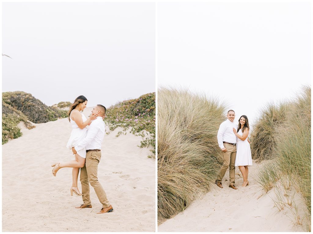 Engaged couple hugging and standing near the grass at Pismo Beach