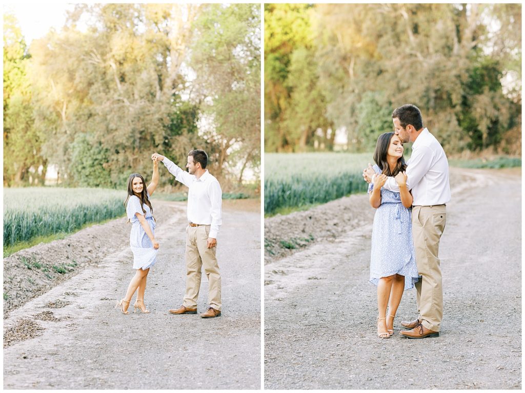 Spring engagement couple dancing in a dirt road