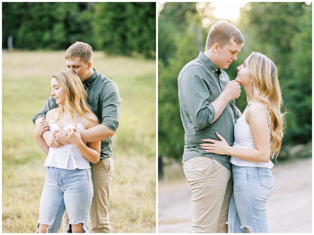 engaged couple embracing during golden hour in a mountain meadow