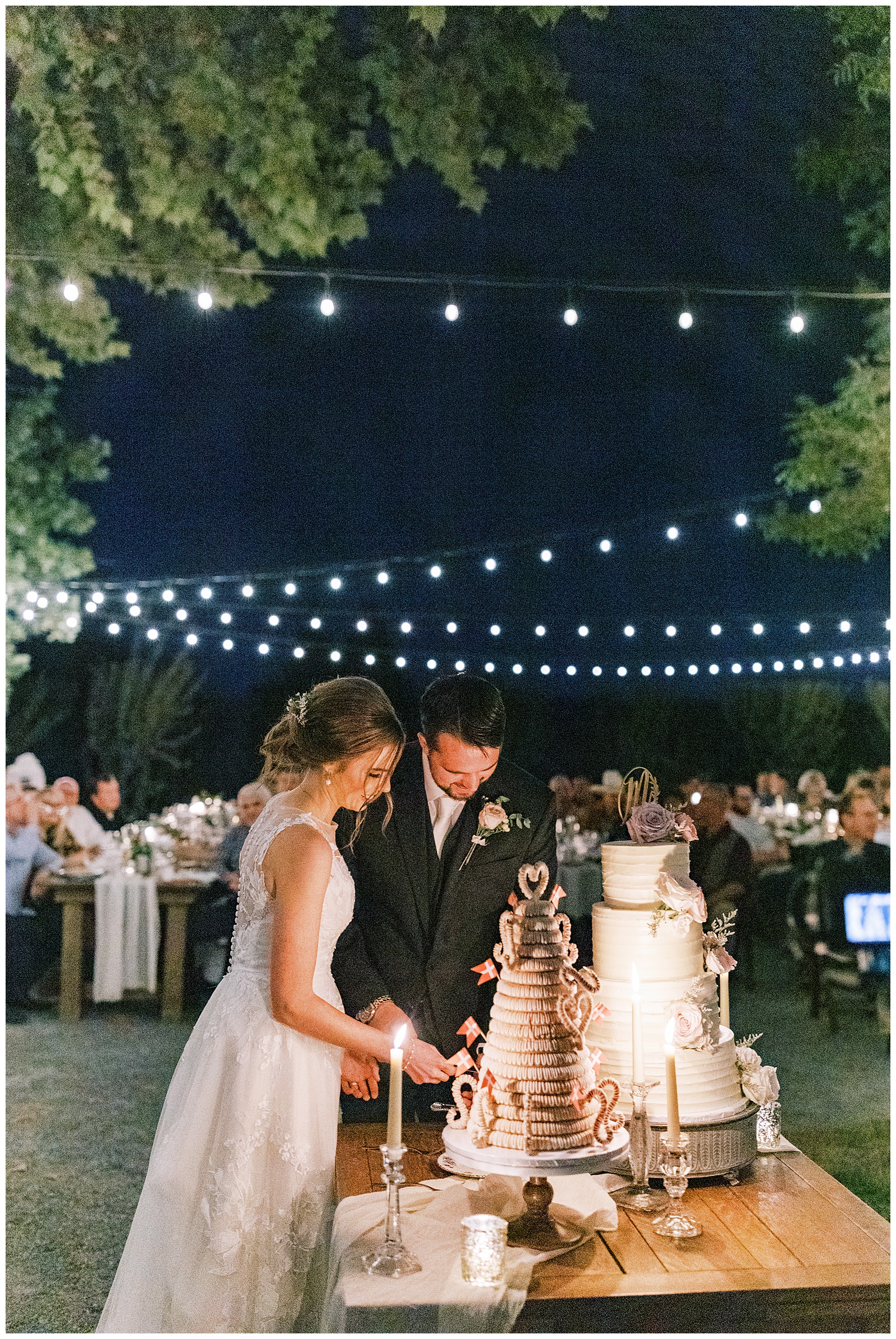 grainy image bride and groom cutting wedding cake backyard wedding