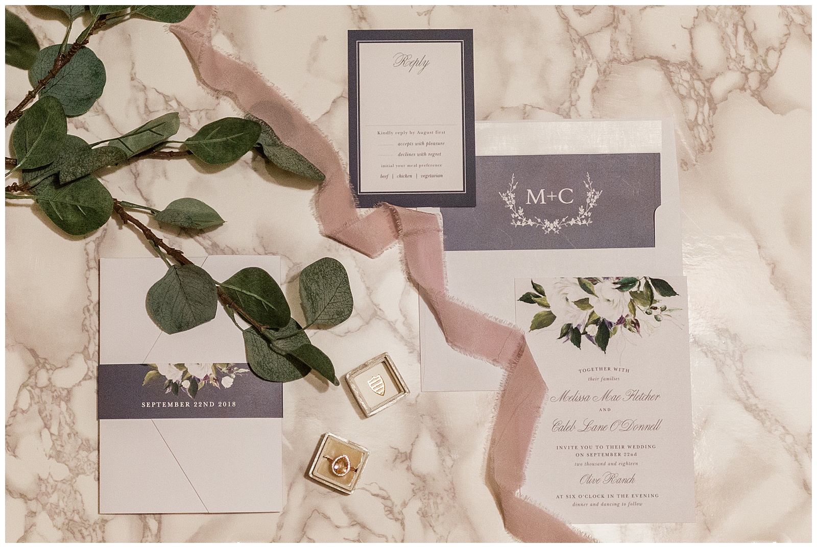 wedding invitation suite with eucalyptus and the mrs box