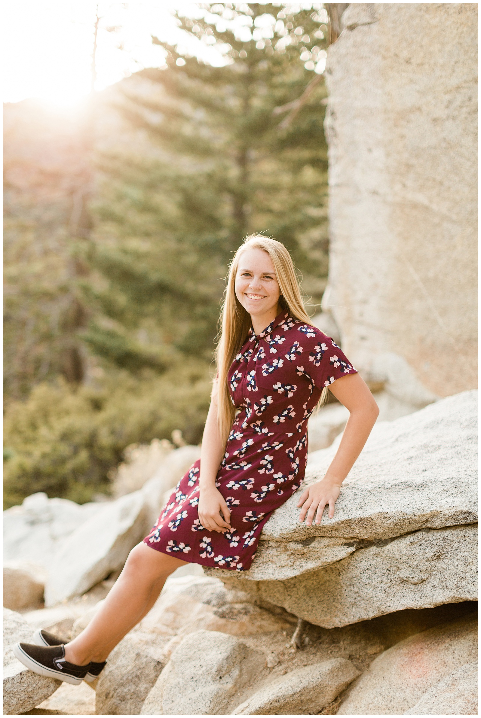 graduate smiling during an outdoor senior portrait session at the palm springs aerial tramway