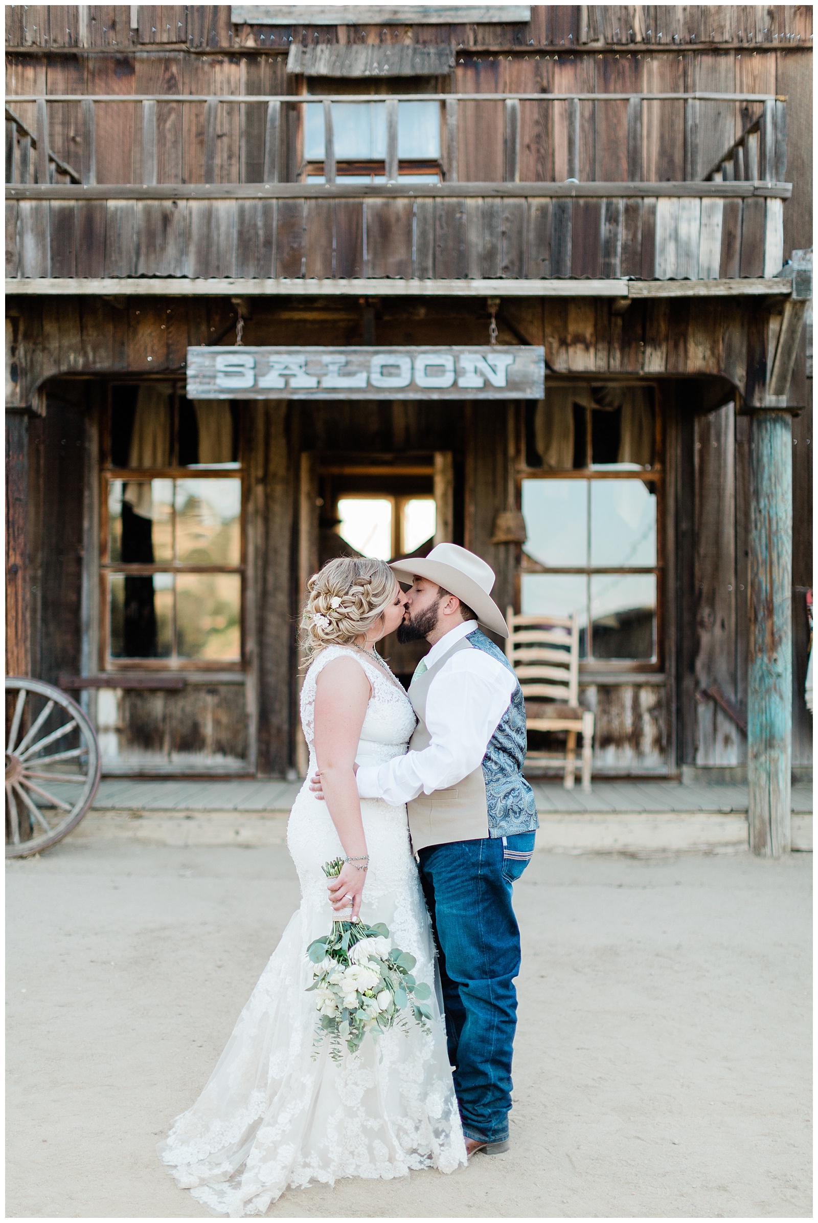 country wedding portraits in front of the saloon at fox creek ranch in hollister
