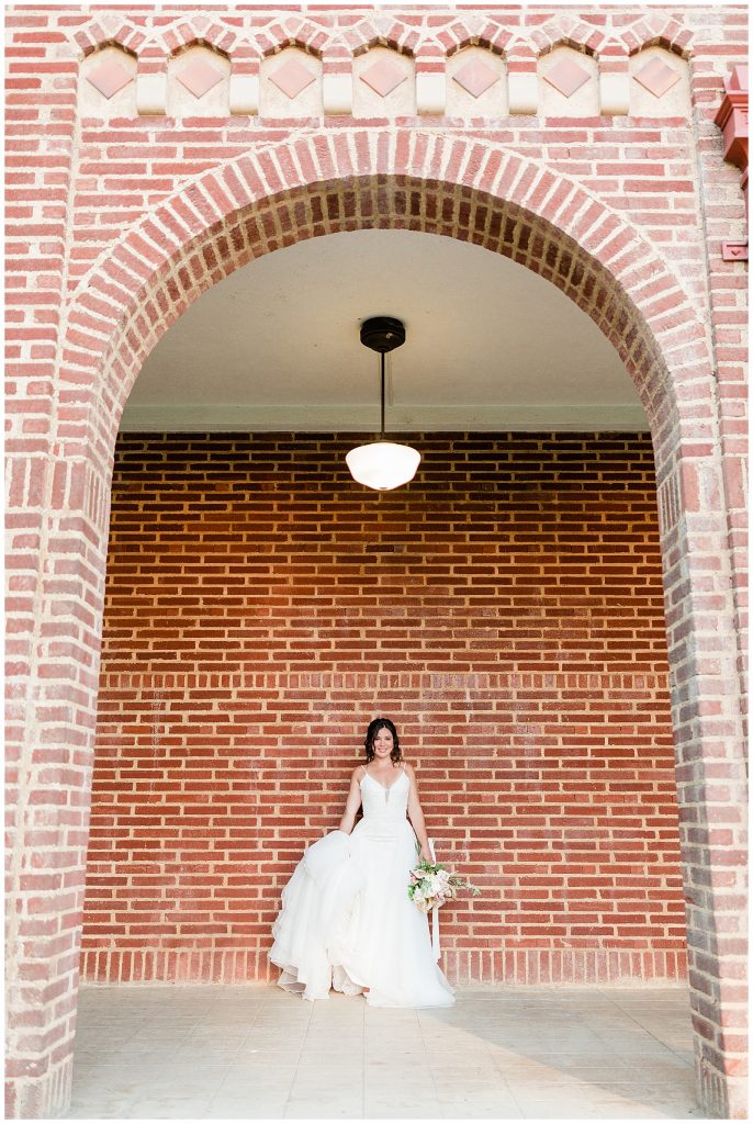 romantic bridal portrait with brick architecture