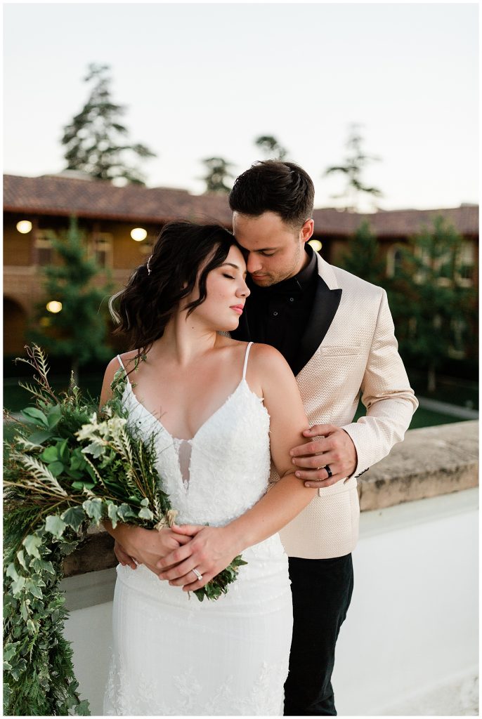 romantic and classic wedding portraits with a garland style wedding bouquet 