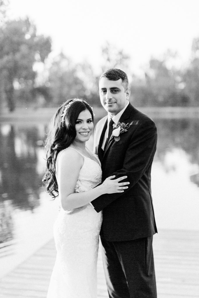 black and white bridal portrait on dock at Wolf Lakes Park