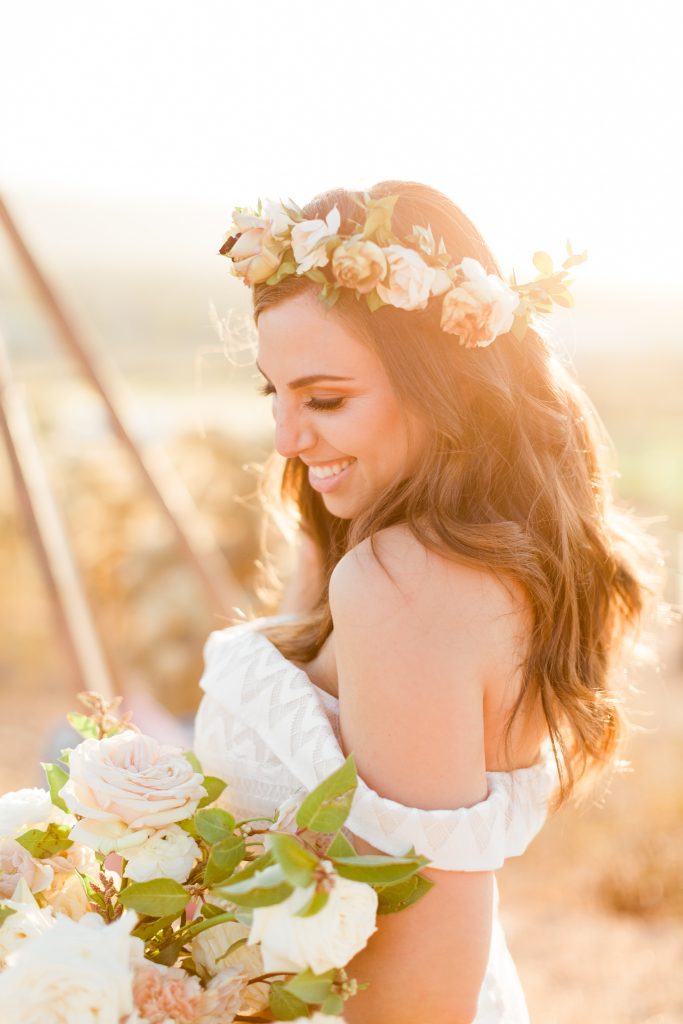 womans portrait with flower crown and bouquet 