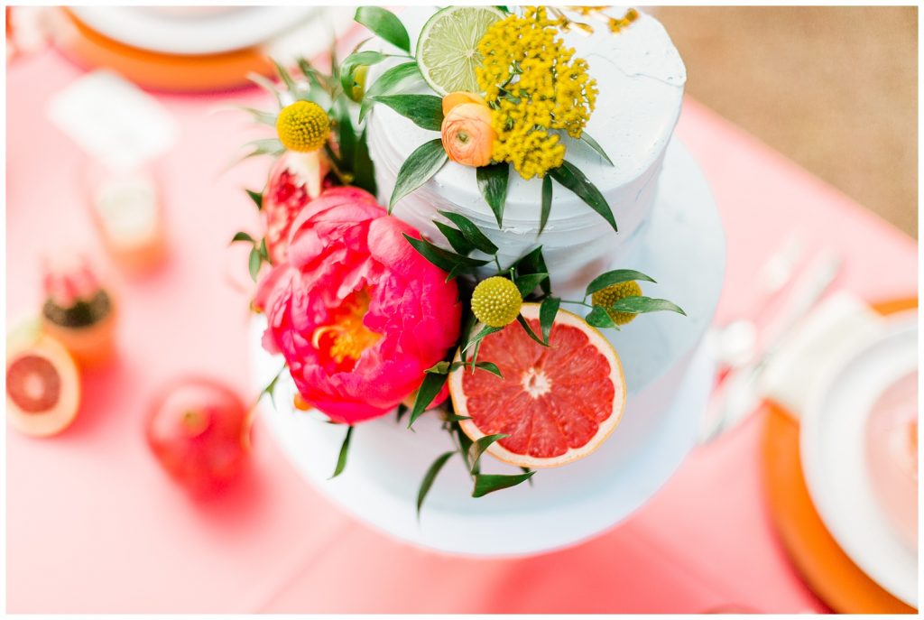 wedding cake with citrus and flowers