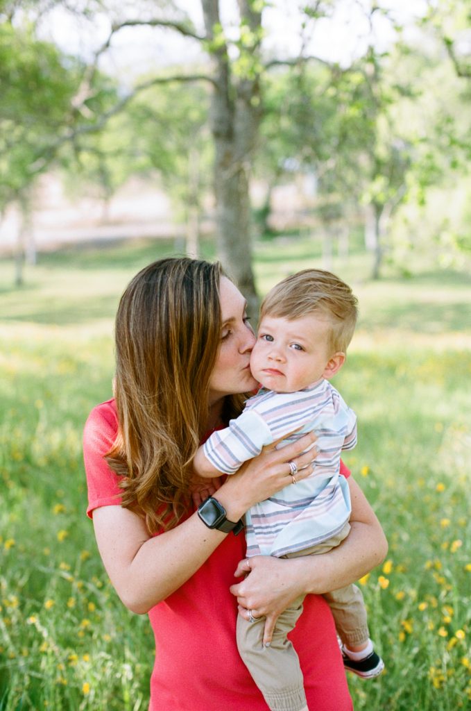 mother and baby son photo in spring grass