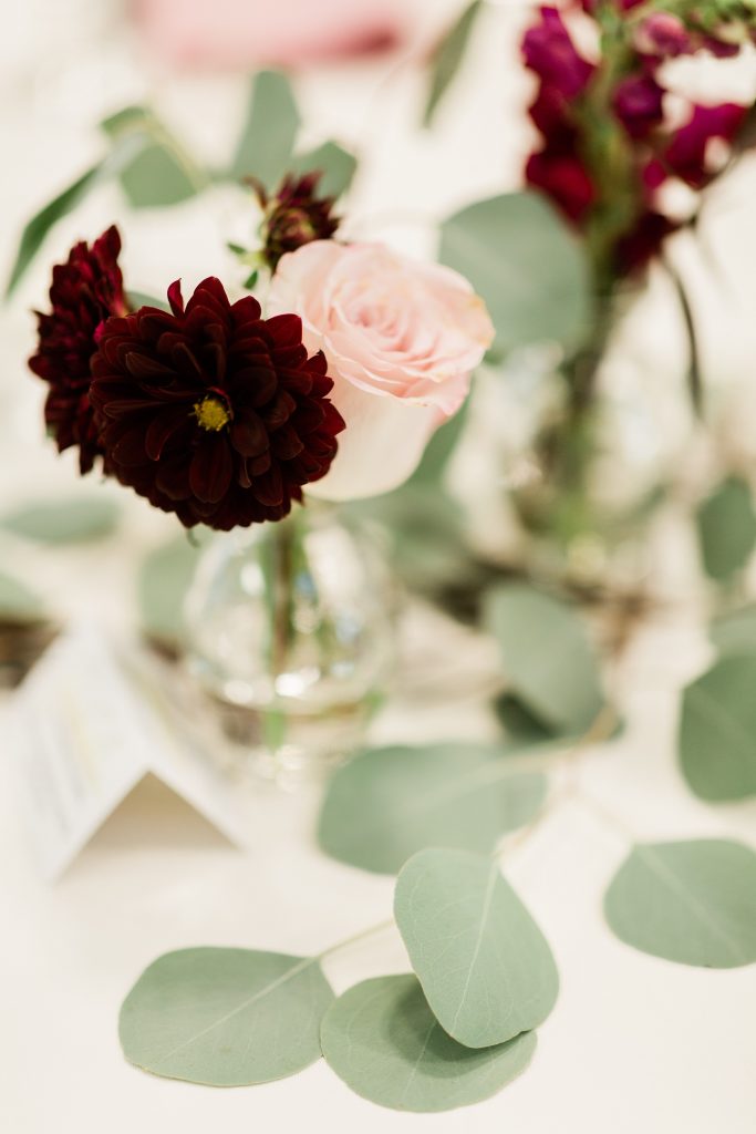 blush and deep red wedding centerpieces